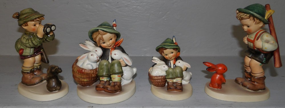 4 Hummel Figurines: 4 Hummel Figurines. Up to 5 3/4" H "ALL DESCRIPTIONS AND ANY CONDITION STATEMENT GIVEN BY LANGSTON AUCTION GALLERY ARE STRICTLY OPINIONS AND LANGSTON'S SHALL HAVE NO RESPONSIBILITY FOR ERRORS OR OMISS