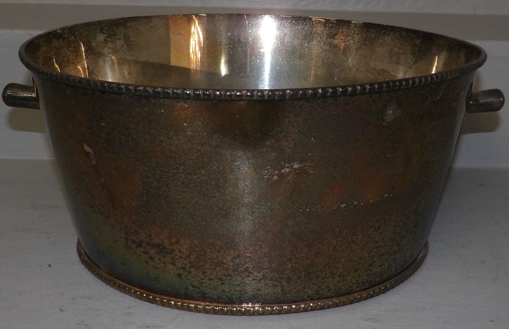 Silverplated Wine Cooler: Silverplated Wine Cooler . 16 1/2" W 13 1/2" D 7" H "ALL DESCRIPTIONS AND ANY CONDITION STATEMENT GIVEN BY LANGSTON AUCTION GALLERY ARE STRICTLY OPINIONS AND LANGSTON'S SHALL HAVE NO RESPONSIBILITY FO