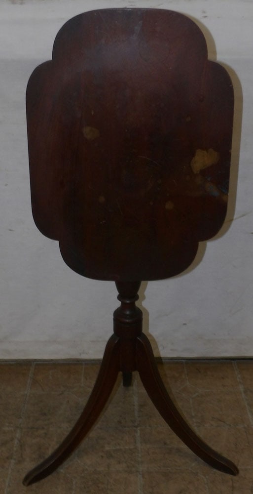 Antique Mahogany Tilt Top Candle Stand: Antique Mahogany Tilt Top Candle Stand . 22" W 16" D 30" H "ALL DESCRIPTIONS AND ANY CONDITION STATEMENT GIVEN BY LANGSTON AUCTION GALLERY ARE STRICTLY OPINIONS AND LANGSTON'S SHALL HAVE NO RESPONSIBI