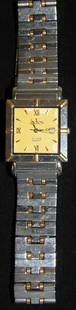 18K Gold Bezel, Gold Link, & Stainless Steel Band Swiss Quartz Croton Men's Wristwatch: 18K Gold Bezel, Gold Link, & Stainless Steel Band Swiss Quartz Croton Men's Wristwatch. "ALL DESCRIPTIONS AND ANY CONDITION STATEMENT GIVEN BY LANGSTON AUCTION GALLERY ARE STRICTLY OPINIONS AND LANGST