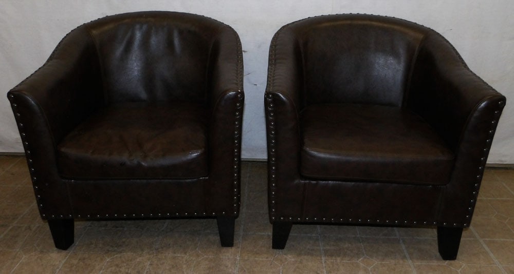 Pair of Vinyl Upholstered Club Chairs: Pair of Vinyl Upholstered Club Chairs . 30 1/2" H "ALL DESCRIPTIONS AND ANY CONDITION STATEMENT GIVEN BY LANGSTON AUCTION GALLERY ARE STRICTLY OPINIONS AND LANGSTON'S SHALL HAVE NO RESPONSIBILITY FOR