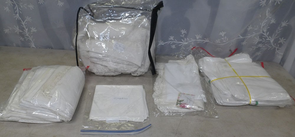 lot of linens: lot of linens. "ALL DESCRIPTIONS AND ANY CONDITION STATEMENT GIVEN BY LANGSTON AUCTION GALLERY ARE STRICTLY OPINIONS AND LANGSTON'S SHALL HAVE NO RESPONSIBILITY FOR ERRORS OR OMISSIONS. THE ABSENCE OF