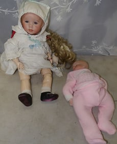 2 porcelain head doll