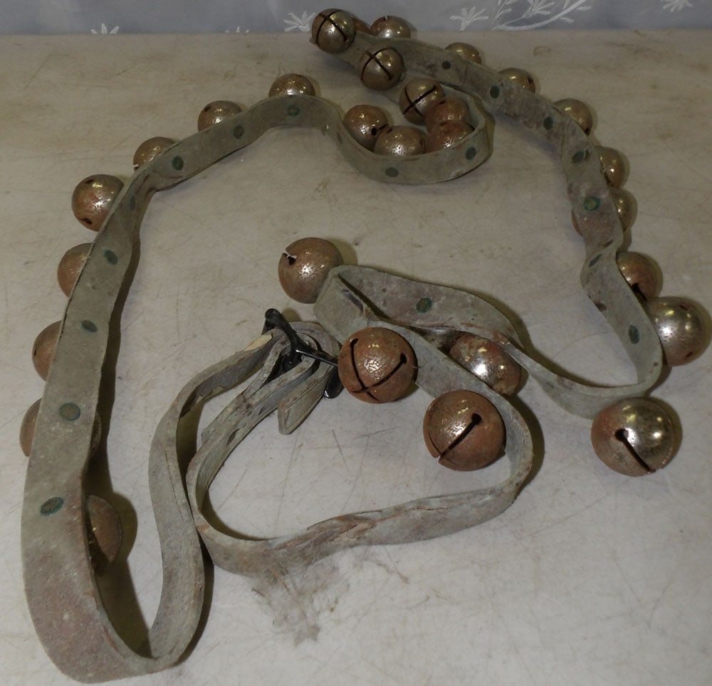 lot of sleigh bells: lot of sleigh bells. "ALL DESCRIPTIONS AND ANY CONDITION STATEMENT GIVEN BY LANGSTON AUCTION GALLERY ARE STRICTLY OPINIONS AND LANGSTON'S SHALL HAVE NO RESPONSIBILITY FOR ERRORS OR OMISSIONS. THE ABSE