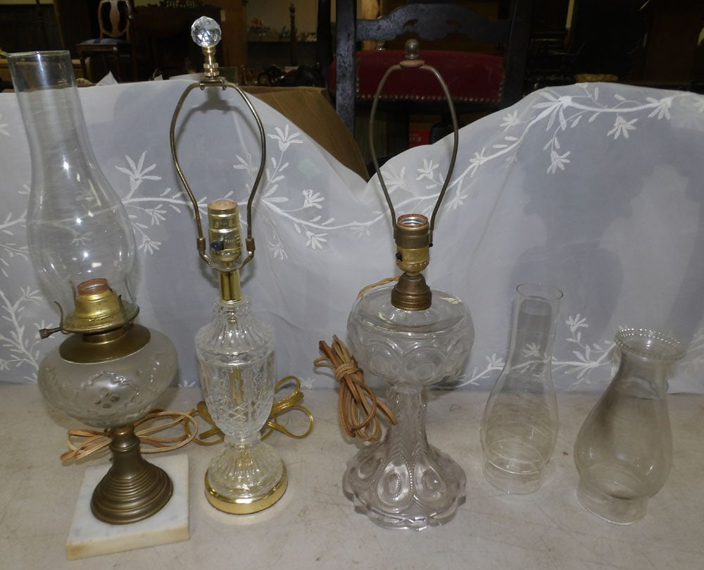 lot of antique glass oil lamps converter and crystal lamp: lot of antique glass oil lamps converter and crystal lamp. "ALL DESCRIPTIONS AND ANY CONDITION STATEMENT GIVEN BY LANGSTON AUCTION GALLERY ARE STRICTLY OPINIONS AND LANGSTON'S SHALL HAVE NO RESPONSIBI