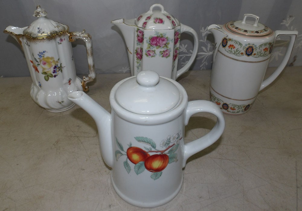 lot of porcelain teapots: lot of porcelain teapots. "ALL DESCRIPTIONS AND ANY CONDITION STATEMENT GIVEN BY LANGSTON AUCTION GALLERY ARE STRICTLY OPINIONS AND LANGSTON'S SHALL HAVE NO RESPONSIBILITY FOR ERRORS OR OMISSIONS. THE