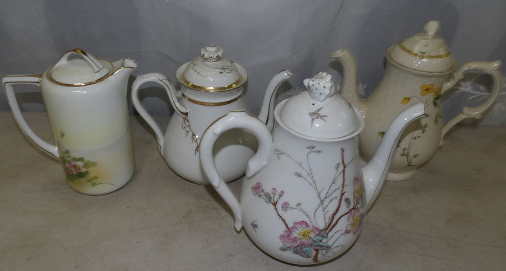lot of porcelain teapots: lot of porcelain teapots. "ALL DESCRIPTIONS AND ANY CONDITION STATEMENT GIVEN BY LANGSTON AUCTION GALLERY ARE STRICTLY OPINIONS AND LANGSTON'S SHALL HAVE NO RESPONSIBILITY FOR ERRORS OR OMISSIONS. THE