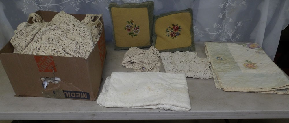 lot of crocheted coverlets and needlepoint pillows (1 of 4)