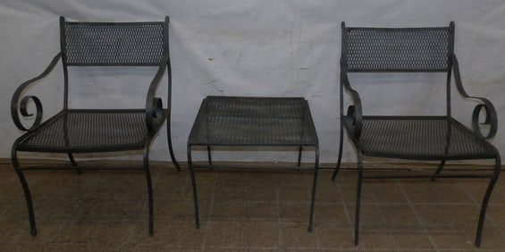 painted wrought iron arm chairs and table