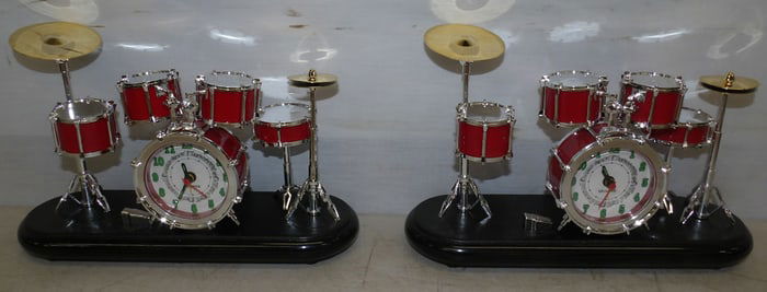 two decorative drum set clocks by Quartz