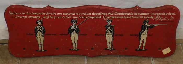 painted pine hanging board with soldiers motif