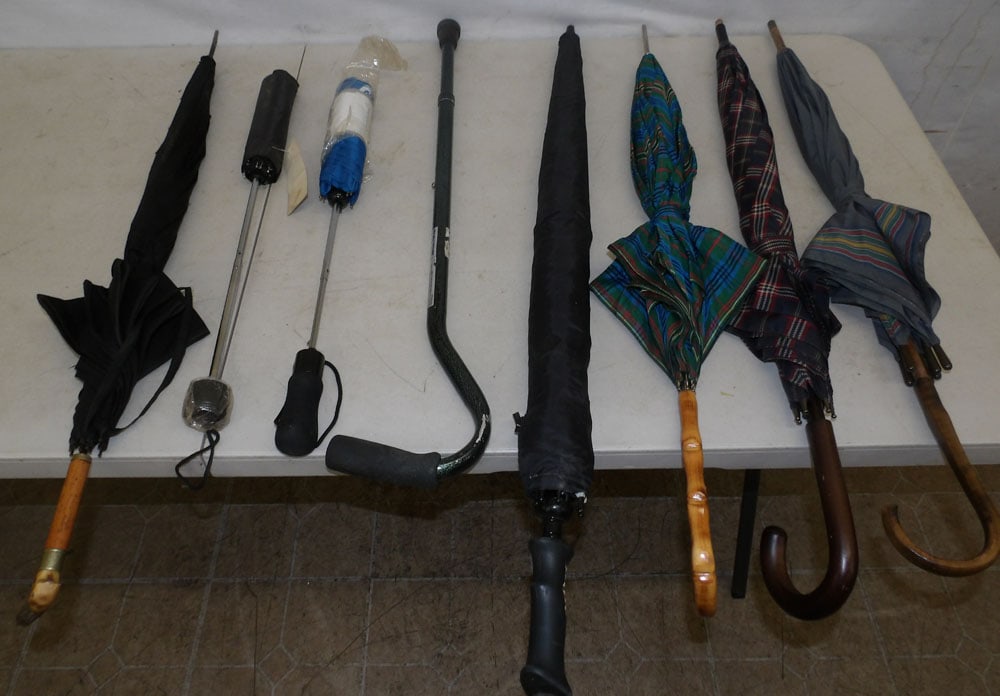 lot of parasol, umbrellas and one walking stick (1 of 3)