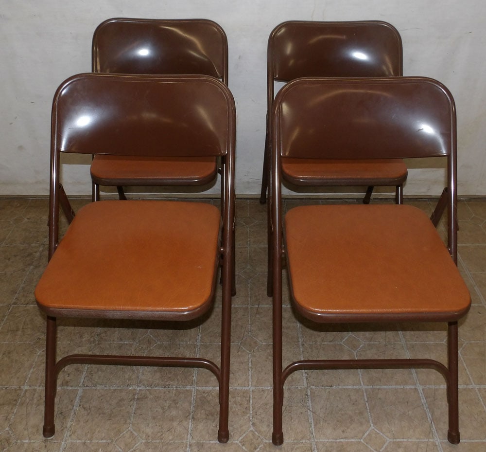 4 metal folding chairs: 4 metal folding chairs. 29 1/2" H "ALL DESCRIPTIONS AND ANY CONDITION STATEMENT GIVEN BY LANGSTON AUCTION GALLERY ARE STRICTLY OPINIONS AND LANGSTON'S SHALL HAVE NO RESPONSIBILITY FOR ERRORS OR OMISSI