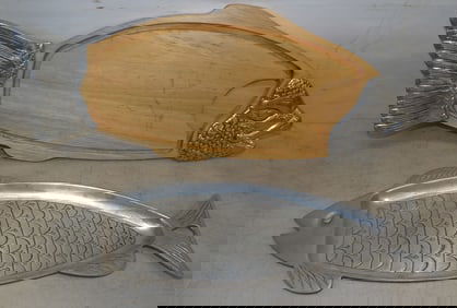 two aluminum and wood fish platters