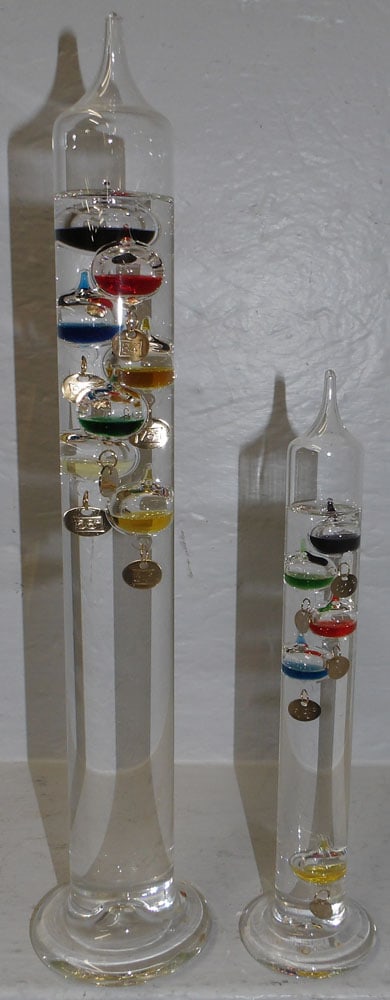 Two Galileo Thermometers: Two Galileo Thermometers. Up to 16 1/4" L "ALL DESCRIPTIONS AND ANY CONDITION STATEMENT GIVEN BY LANGSTON AUCTION GALLERY ARE STRICTLY OPINIONS AND LANGSTON'S SHALL HAVE NO RESPONSIBILITY FOR ERRORS O