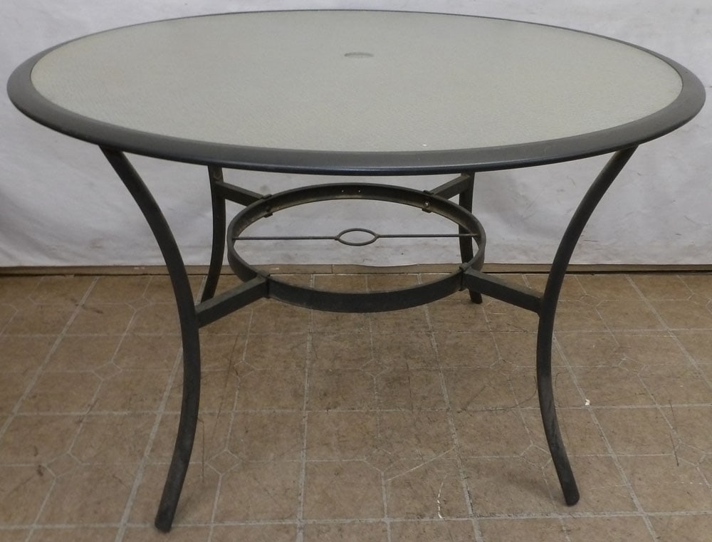 Painted Metal & Glass Top Outdoor Table: Painted Metal & Glass Top Outdoor Table . 43 1/2" Dia. 28 1/2" H "ALL DESCRIPTIONS AND ANY CONDITION STATEMENT GIVEN BY LANGSTON AUCTION GALLERY ARE STRICTLY OPINIONS AND LANGSTON'S SHALL HAVE NO RESP