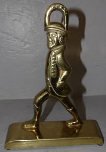 Brass Virginia Metalcrafters Hessian Soldier Door Stop: Brass Virginia Metalcrafters Hessian Soldier Door Stop. 8 1/2" H "ALL DESCRIPTIONS AND ANY CONDITION STATEMENT GIVEN BY LANGSTON AUCTION GALLERY ARE STRICTLY OPINIONS AND LANGSTON'S SHALL HAVE NO RESP