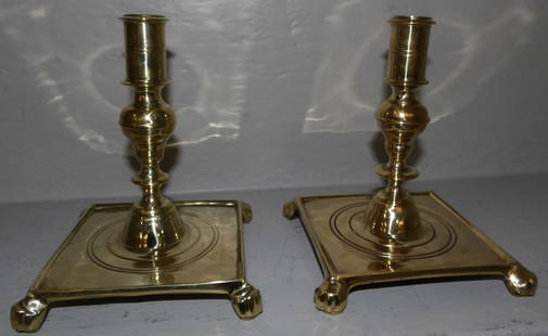 pair of heavy brass square base candlesticks by Virginia Metalcrafters: pair of heavy brass square base candlesticks by Virginia Metalcrafters. 6 3/4" H "ALL DESCRIPTIONS AND ANY CONDITION STATEMENT GIVEN BY LANGSTON AUCTION GALLERY ARE STRICTLY OPINIONS AND LANGSTON'S SH