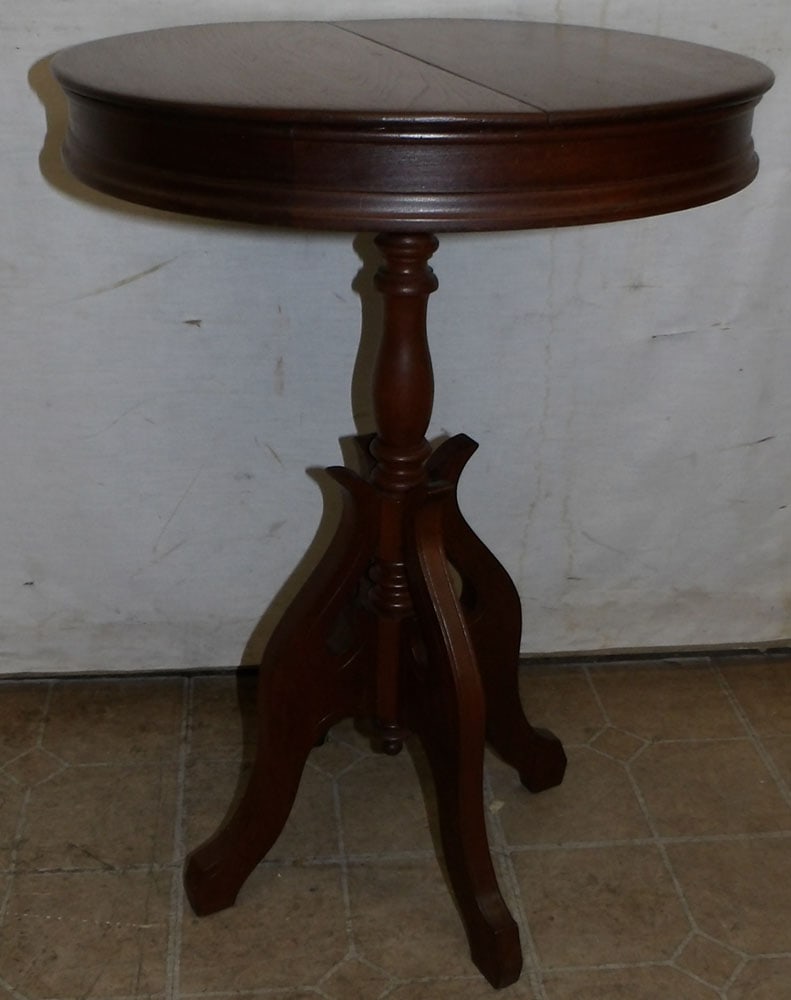 antique walnut Victorian drum table: antique walnut Victorian drum table. 19 1/2" Dia. 27 3/4" H "ALL DESCRIPTIONS AND ANY CONDITION STATEMENT GIVEN BY LANGSTON AUCTION GALLERY ARE STRICTLY OPINIONS AND LANGSTON'S SHALL HAVE NO RESPONSIB