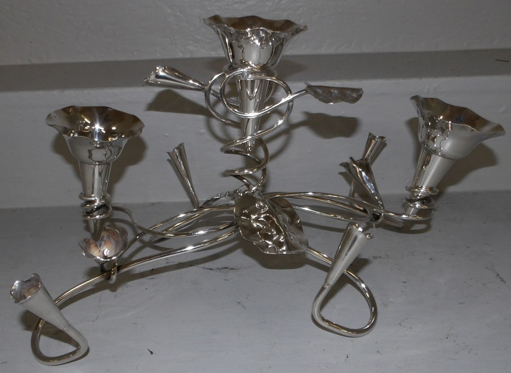 silver plated epergne: silver plated epergne. 16" Dia. 9 1/4" H "ALL DESCRIPTIONS AND ANY CONDITION STATEMENT GIVEN BY LANGSTON AUCTION GALLERY ARE STRICTLY OPINIONS AND LANGSTON'S SHALL HAVE NO RESPONSIBILITY FOR ERRORS OR
