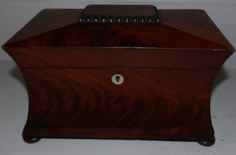 19th century mahogany tea caddy: 19th century mahogany tea caddy. 10 1/4" W 6" D 6 3/4" H "ALL DESCRIPTIONS AND ANY CONDITION STATEMENT GIVEN BY LANGSTON AUCTION GALLERY ARE STRICTLY OPINIONS AND LANGSTON'S SHALL HAVE NO RESPONSIBILI