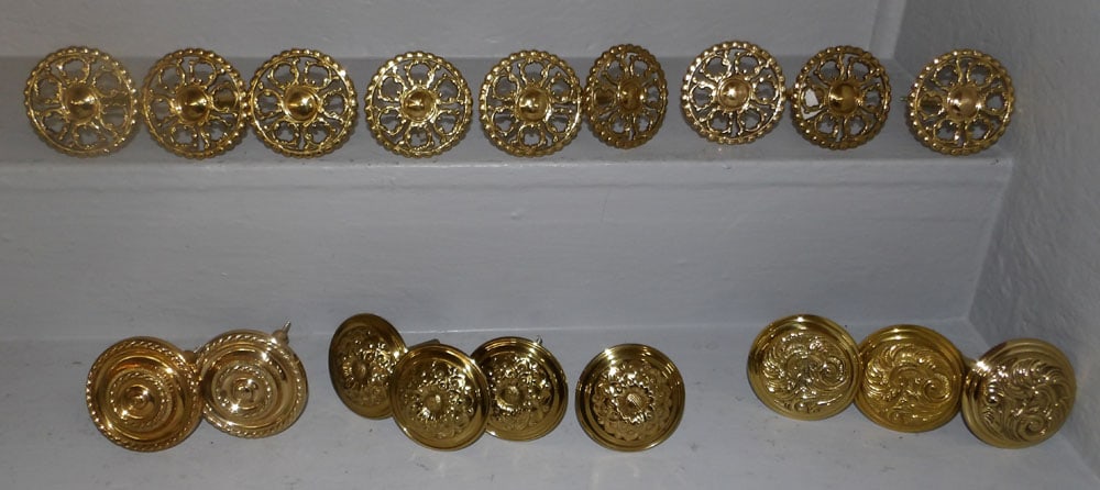 18 brass medallion rosette curtain tie backs: 18 brass medallion rosette curtain tie backs. 3" Dia. "ALL DESCRIPTIONS AND ANY CONDITION STATEMENT GIVEN BY LANGSTON AUCTION GALLERY ARE STRICTLY OPINIONS AND LANGSTON'S SHALL HAVE NO RESPONSIBILITY