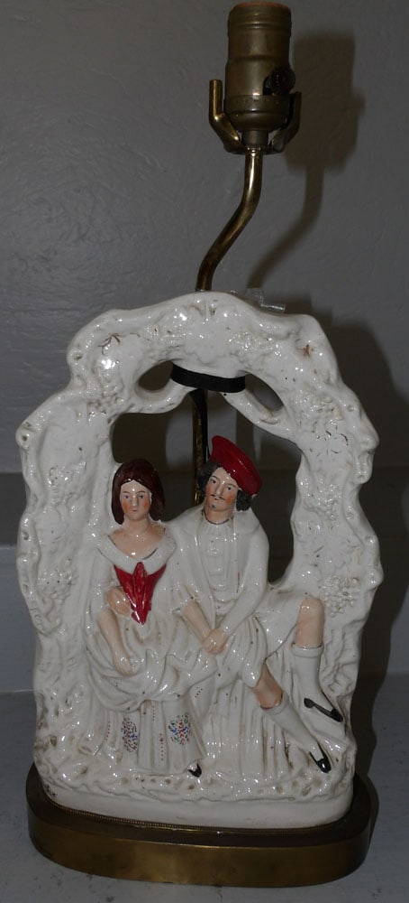 antique Staffordshire figure, "Romantic Couple Under Arbor", made into lamp: antique Staffordshire figure, "Romantic Couple Under Arbor", made into lamp . 20 1/2" H "ALL DESCRIPTIONS AND ANY CONDITION STATEMENT GIVEN BY LANGSTON AUCTION GALLERY ARE STRICTLY OPINIONS AND LANGST