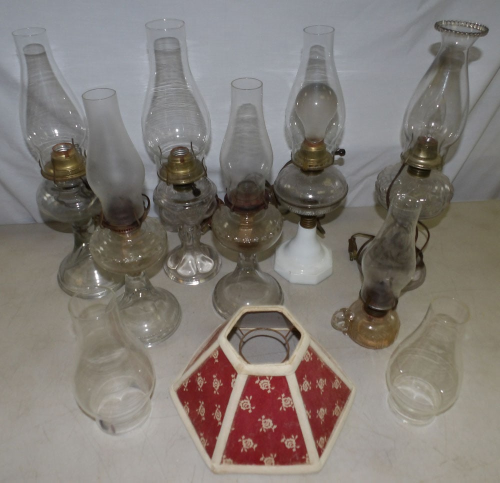 lot of antique glass oil lamps some electrified: lot of antique glass oil lamps some electrified. ALL DESCRIPTIONS AND ANY CONDITION STATEMENT GIVEN BY LANGSTON AUCTION GALLERY ARE STRICTLY OPINIONS AND LANGSTON'S SHALL HAVE NO RESPONSIBILITY FOR ER