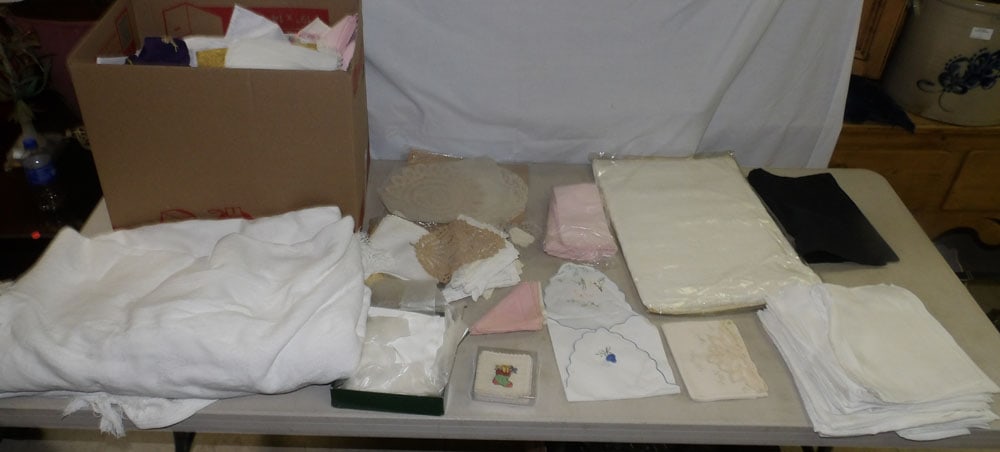 lot of linens: lot of linens . ALL DESCRIPTIONS AND ANY CONDITION STATEMENT GIVEN BY LANGSTON AUCTION GALLERY ARE STRICTLY OPINIONS AND LANGSTON'S SHALL HAVE NO RESPONSIBILITY FOR ERRORS OR OMISSIONS. THE ABSENCE OF