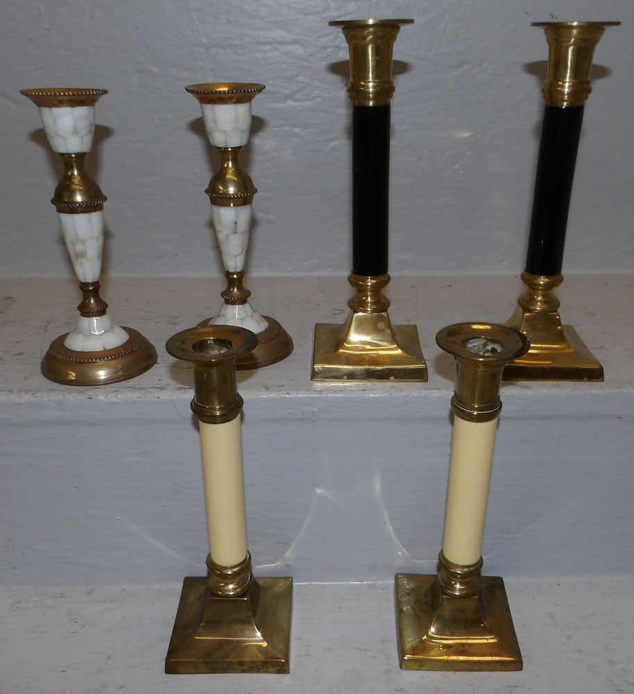 Lot of Brass Candlesticks: Lot of Brass Candlesticks . Up to 8 1/4" H ALL DESCRIPTIONS AND ANY CONDITION STATEMENT GIVEN BY LANGSTON AUCTION GALLERY ARE STRICTLY OPINIONS AND LANGSTON'S SHALL HAVE NO RESPONSIBILITY FOR ERRORS O