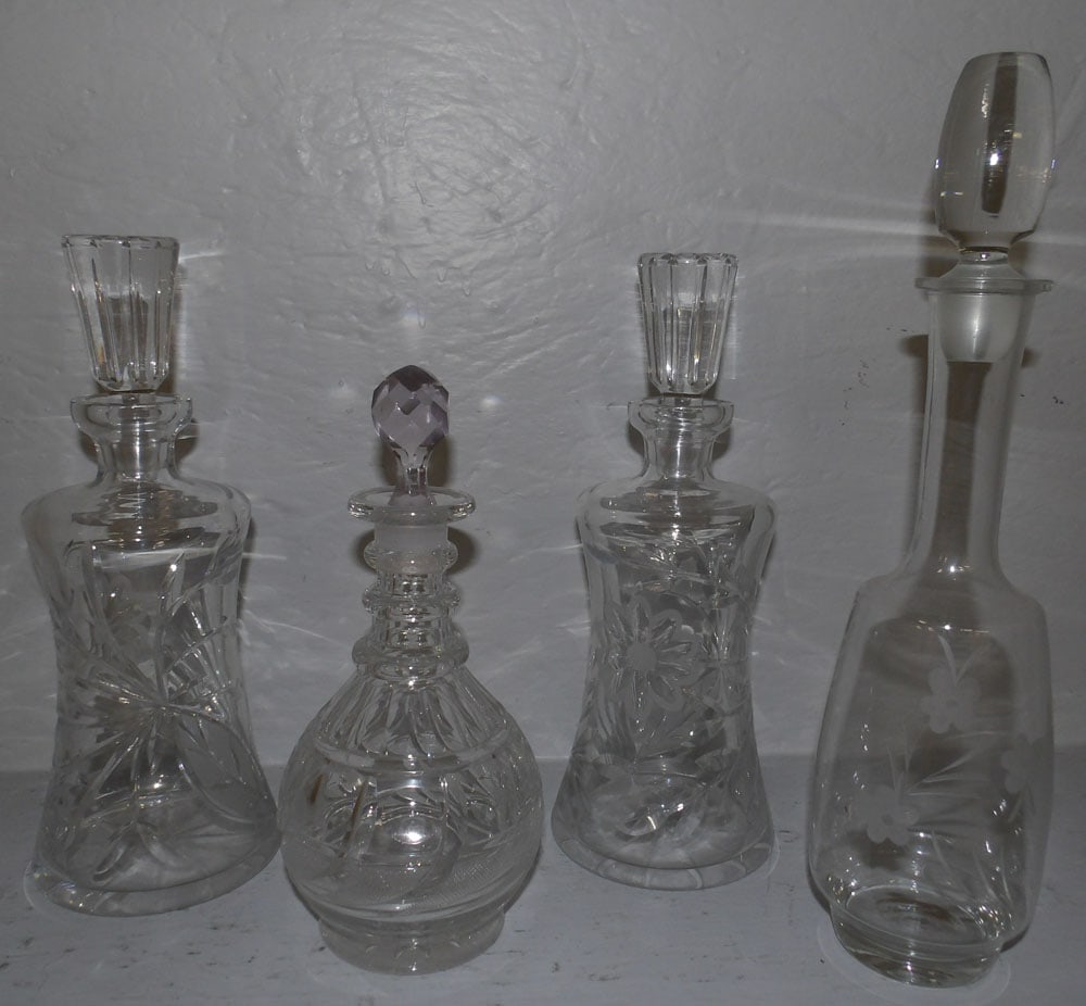 Lot of Crystal Decanters: Lot of Crystal Decanters . Up to 13 3/4" H ALL DESCRIPTIONS AND ANY CONDITION STATEMENT GIVEN BY LANGSTON AUCTION GALLERY ARE STRICTLY OPINIONS AND LANGSTON'S SHALL HAVE NO RESPONSIBILITY FOR ERRORS O