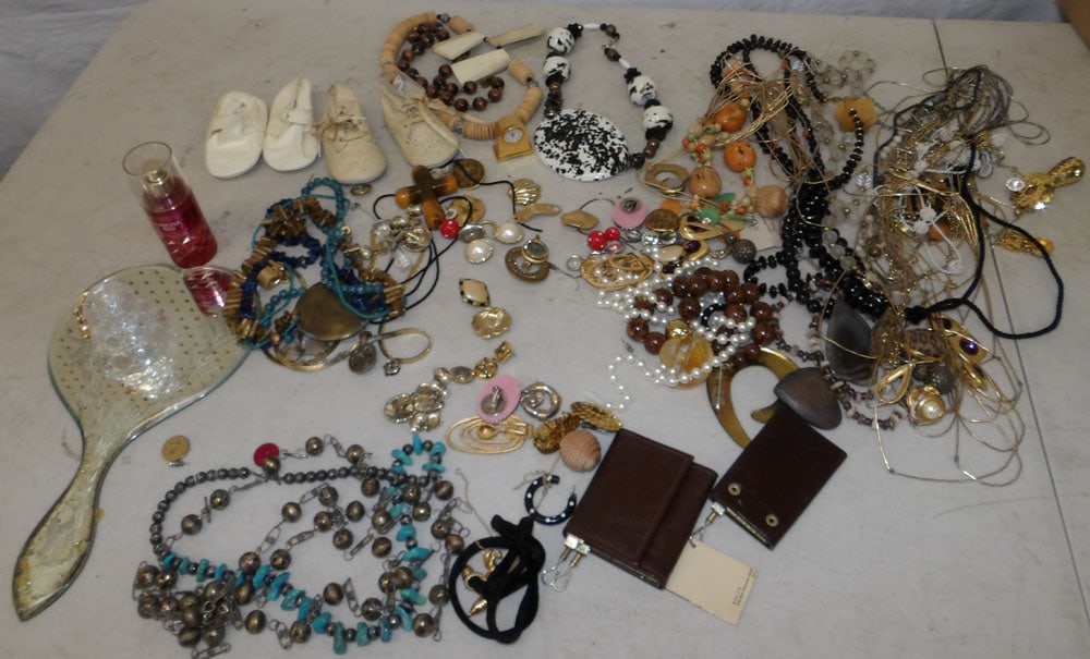 Lot of Costume Jewelry & Baby Shoes: Lot of Costume Jewelry & Baby Shoes . ALL DESCRIPTIONS AND ANY CONDITION STATEMENT GIVEN BY LANGSTON AUCTION GALLERY ARE STRICTLY OPINIONS AND LANGSTON'S SHALL HAVE NO RESPONSIBILITY FOR ERRORS OR OMI