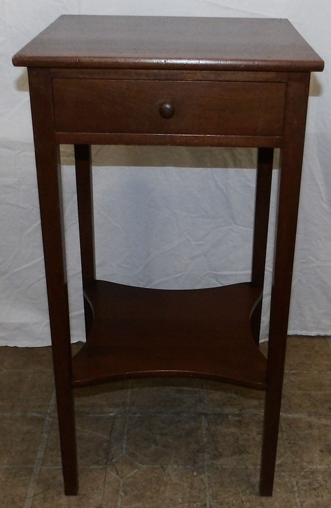 Mahogany One Drawer Stand: Mahogany One Drawer Stand . 15" Dia. 28 1/2" H ALL DESCRIPTIONS AND ANY CONDITION STATEMENT GIVEN BY LANGSTON AUCTION GALLERY ARE STRICTLY OPINIONS AND LANGSTON'S SHALL HAVE NO RESPONSIBILITY FOR ERRO