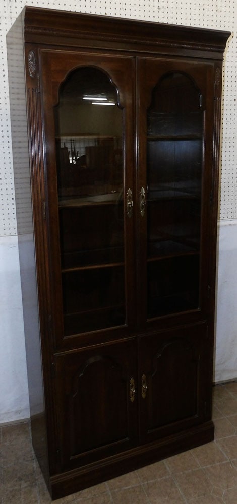 Cherry Glass Door Lighted Curio Cabinet by Ethan Allen: Cherry Glass Door Lighted Curio Cabinet by Ethan Allen. 34" W 16 1/4" D 78 1/4" H ALL DESCRIPTIONS AND ANY CONDITION STATEMENT GIVEN BY LANGSTON AUCTION GALLERY ARE STRICTLY OPINIONS AND LANGSTON'S SH