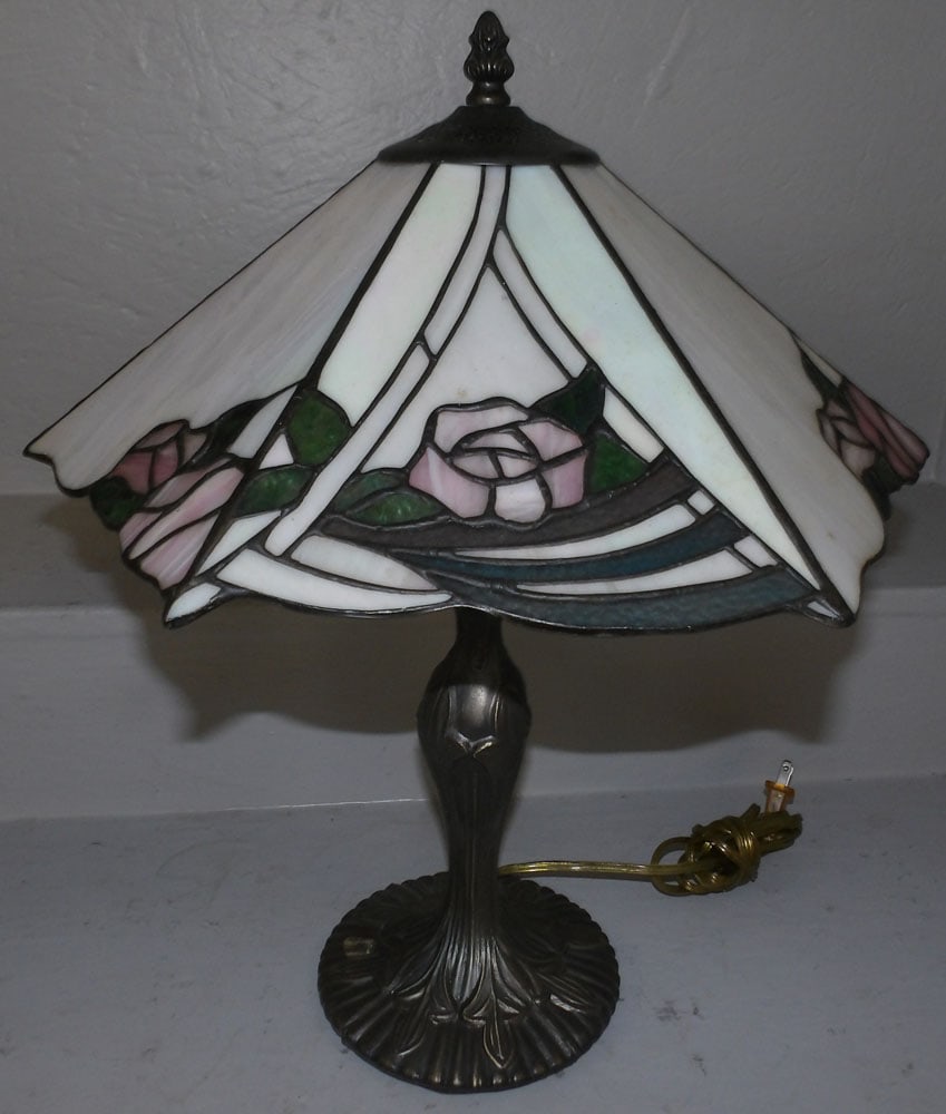 Leaded Stain Glass Tiffany Style Lamp: Leaded Stain Glass Tiffany Style Lamp . 19" H ALL DESCRIPTIONS AND ANY CONDITION STATEMENT GIVEN BY LANGSTON AUCTION GALLERY ARE STRICTLY OPINIONS AND LANGSTON'S SHALL HAVE NO RESPONSIBILITY FOR ERROR
