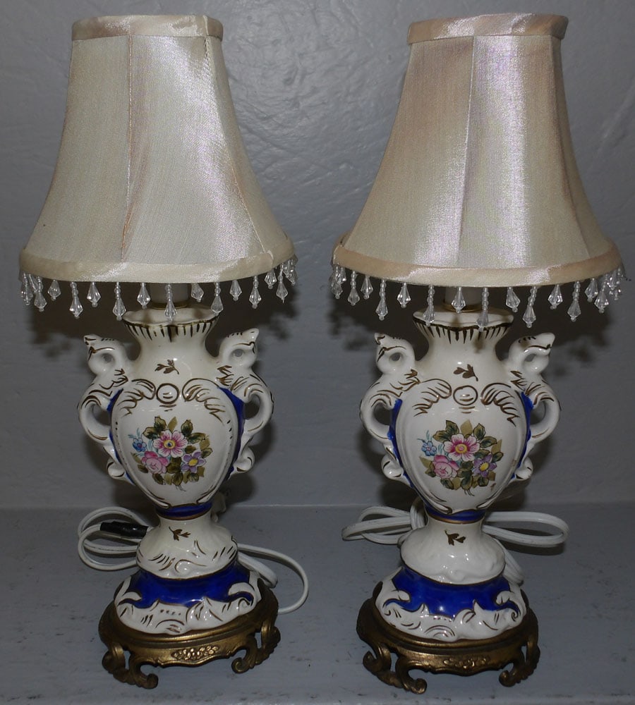 Pair of Painted Porcelain Lamps: Pair of Painted Porcelain Lamps. 15 1/4" H ALL DESCRIPTIONS AND ANY CONDITION STATEMENT GIVEN BY LANGSTON AUCTION GALLERY ARE STRICTLY OPINIONS AND LANGSTON'S SHALL HAVE NO RESPONSIBILITY FOR ERRORS O