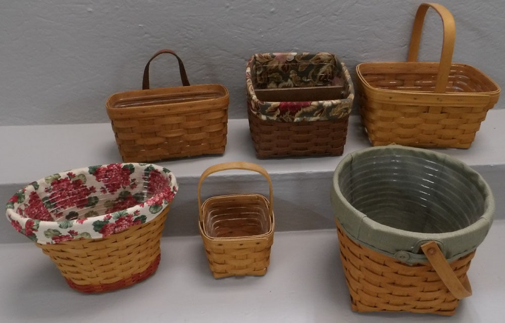 Lot of Six Longaberger Baskets: Lot of Six Longaberger Baskets. Up to 8 1/2" H ALL DESCRIPTIONS AND ANY CONDITION STATEMENT GIVEN BY LANGSTON AUCTION GALLERY ARE STRICTLY OPINIONS AND LANGSTON'S SHALL HAVE NO RESPONSIBILITY FOR ERRO