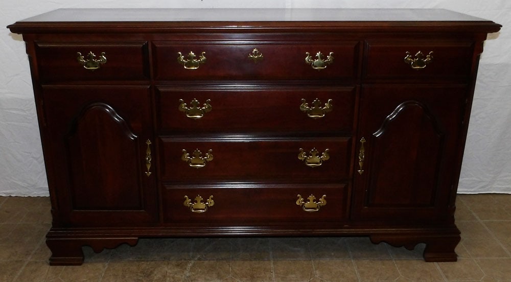 Cherry Sideboard by Sumter Cabinet Company: Cherry Sideboard by Sumter Cabinet Company . 60" W 18 1/4" D 34" H ALL DESCRIPTIONS AND ANY CONDITION STATEMENT GIVEN BY LANGSTON AUCTION GALLERY ARE STRICTLY OPINIONS AND LANGSTON'S SHALL HAVE NO RES