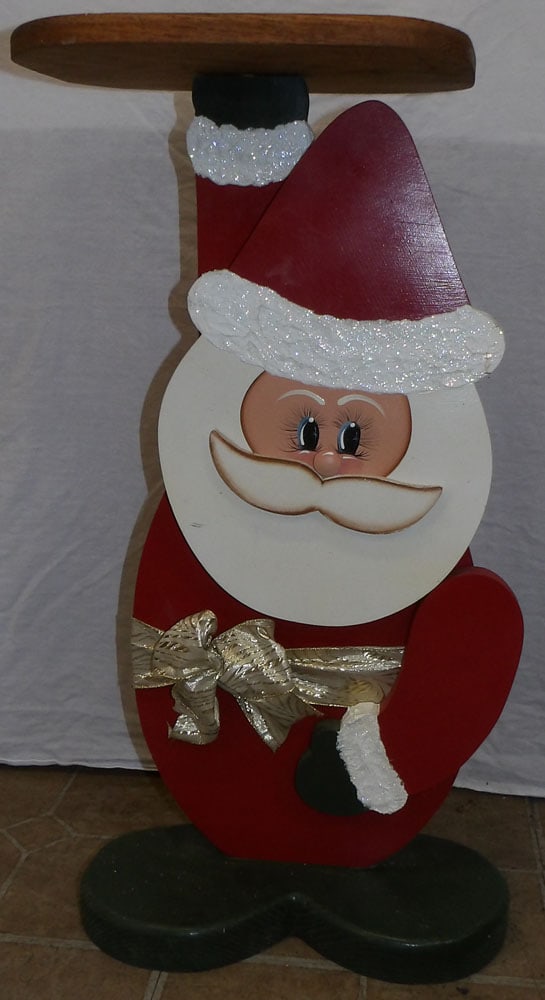 Painted Wood Santa Claus Stand: Painted Wood Santa Claus Stand. 26 1/2" H ALL DESCRIPTIONS AND ANY CONDITION STATEMENT GIVEN BY LANGSTON AUCTION GALLERY ARE STRICTLY OPINIONS AND LANGSTON'S SHALL HAVE NO RESPONSIBILITY FOR ERRORS OR