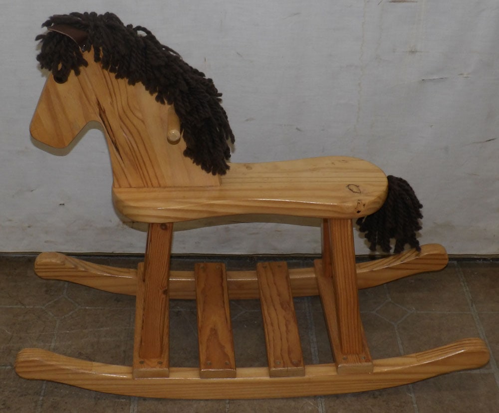 Pine Hobby Horse: Pine Hobby Horse . 30" W 24" H ALL DESCRIPTIONS AND ANY CONDITION STATEMENT GIVEN BY LANGSTON AUCTION GALLERY ARE STRICTLY OPINIONS AND LANGSTON'S SHALL HAVE NO RESPONSIBILITY FOR ERRORS OR OMISSIONS.