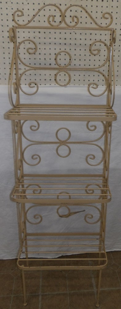 Painted Metal Wall Shelf: Painted Metal Wall Shelf . 18 1/4" W 10 1/2" D 58" H ALL DESCRIPTIONS AND ANY CONDITION STATEMENT GIVEN BY LANGSTON AUCTION GALLERY ARE STRICTLY OPINIONS AND LANGSTON'S SHALL HAVE NO RESPONSIBILITY FO