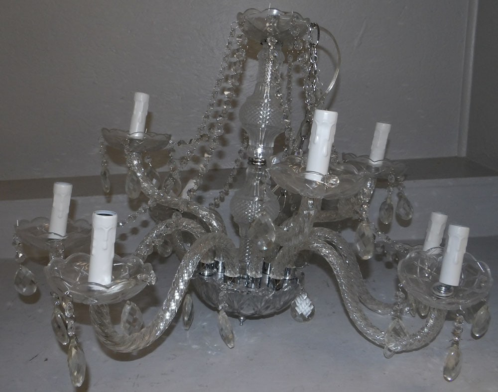 Glass Nine Light Chandelier: Glass Nine Light Chandelier . 19" H ALL DESCRIPTIONS AND ANY CONDITION STATEMENT GIVEN BY LANGSTON AUCTION GALLERY ARE STRICTLY OPINIONS AND LANGSTON'S SHALL HAVE NO RESPONSIBILITY FOR ERRORS OR OMISS