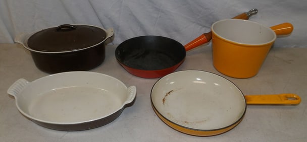 lot of painted cast iron pots by Le Creuset