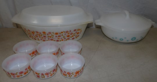 lot of vintage glass casserole dishes