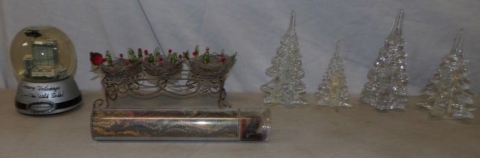 lot of glass Christmas trees and decorative items