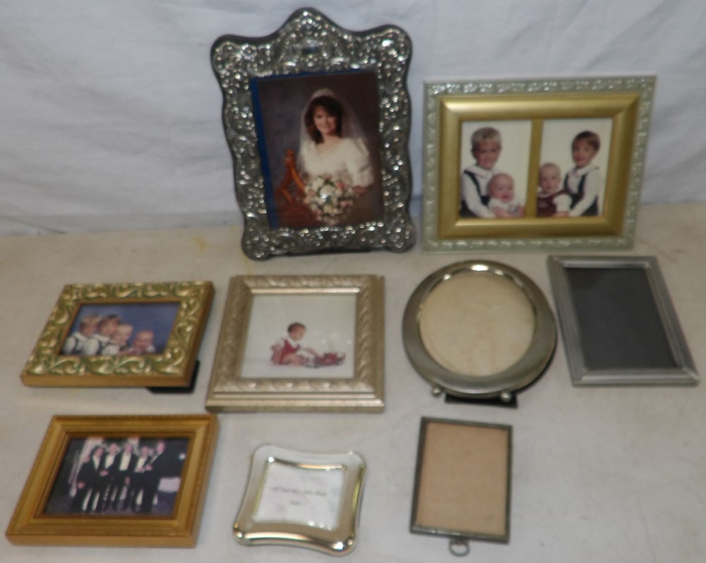 lot of picture frames: lot of picture frames . "ALL DESCRIPTIONS AND ANY CONDITION STATEMENT GIVEN BY LANGSTON AUCTION GALLERY ARE STRICTLY OPINIONS AND LANGSTON'S SHALL HAVE NO RESPONSIBILITY FOR ERRORS OR OMISSIONS. THE A