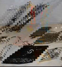 lot of custom jewelry and jewelry stands