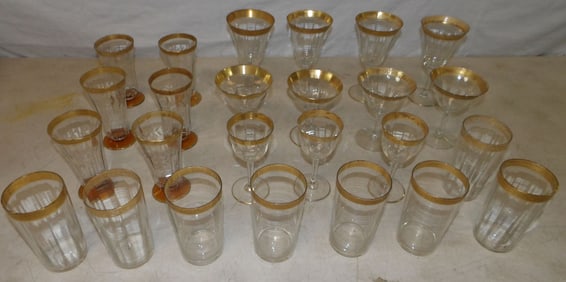 lot of gold rim glasses