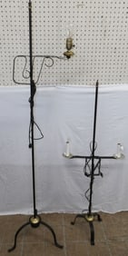 two painted wrought iron floor lamps