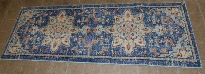2' 2" by 6' machine made rug